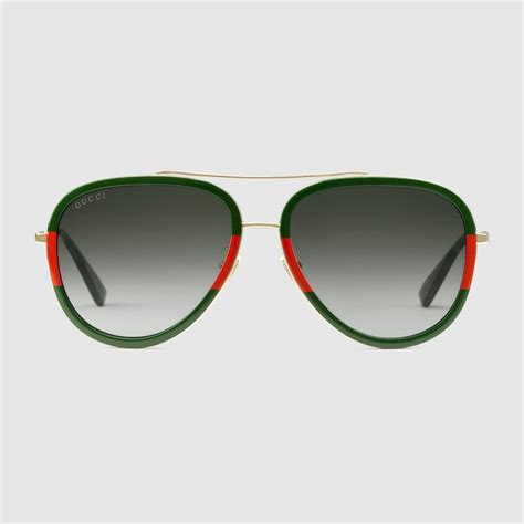 gucci green lens sunglasses.